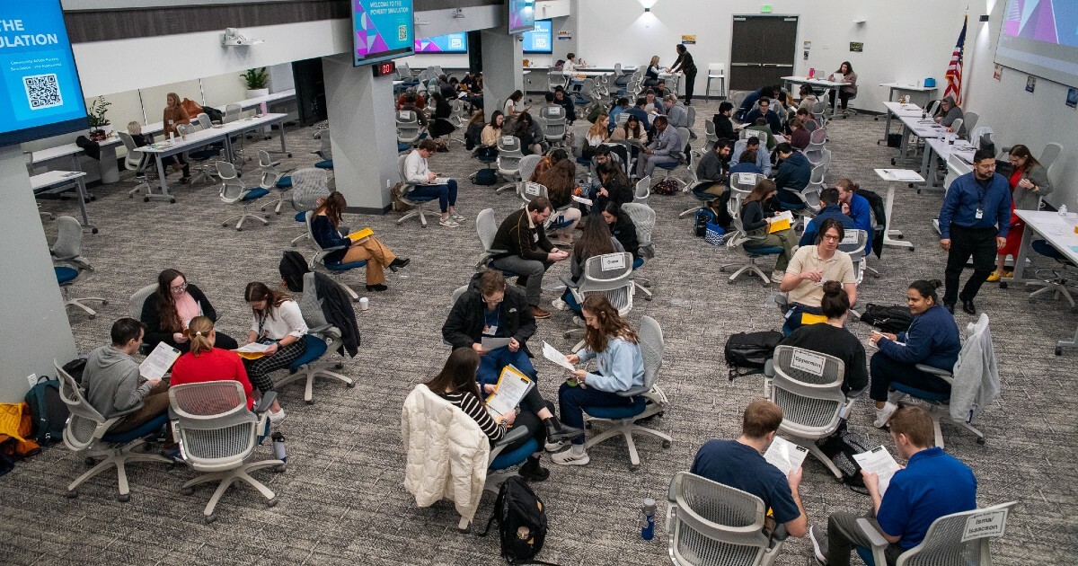 Kansas Health Science Center - KansasCOM holds a poverty simulation for student doctors.